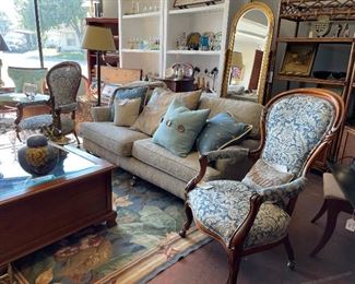 Pair chairs, $375 the pair; Couch, $2950