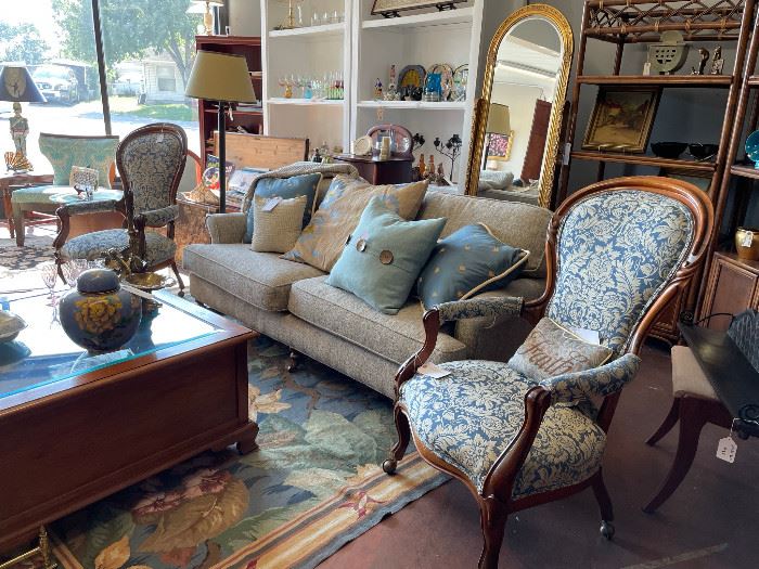 Pair chairs, $375 the pair; Couch, $2950