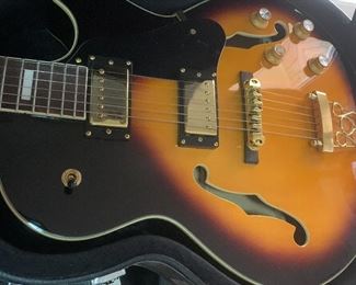 Kona hollow body guitar with case