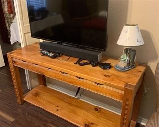 Pine console table and flat screen TV (5 avail)