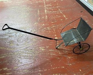 Early Metal Doll Pull Toy