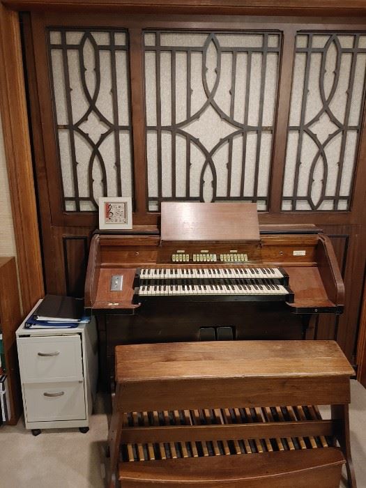 Wicks Organ. Entire organ fits in about an 8' cube minus the detached blower box (trunk size).