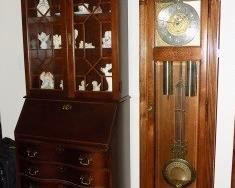 Duncan Phyfe Style Cabine and Howard Miller Moon Phase Grandfather clock.  Both are in excellent conditon. Cabinet is $325.  Clock is $500.