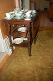 Cups and Saucers and Tea Cart