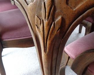 carved detail on dining table