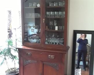 Art Nouveau china cabinet used as a bar