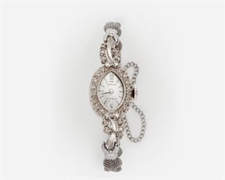 93: Waltham Diamond 14k ladies wristwatch