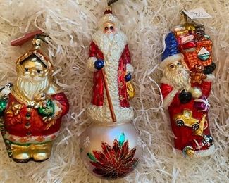 Christopher Radko
22) Frosty Leaf Santa” 48.  SOLD
23)15th Anniversary Russian Winter Blossom Fest 145. 
24) Santa with Basket, blue hat,toys falling 70.