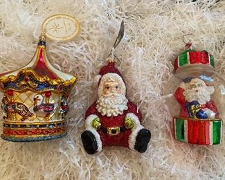 Christopher Radko 
37)Menagerie Go Round”
Limited Edition 180/756  200.
38)”Santa Baby” 60.
39)Santa in glass bubble  48.