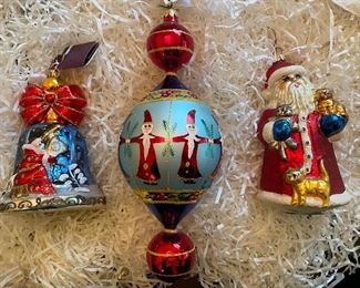 Christopher Radko:                                                                            64) "Celestial Chimes"   60.                                                             65) "15th Anniversary Circle of Santas"  125.                         66) Santa with 3 cats  45.