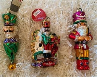 Christopher Radko:                                                                         
104) Green nutcracker   45.    SOLD                                                              
105) "What Should I Wear?"  75.                      
106) Nutcracker purple hat  60.