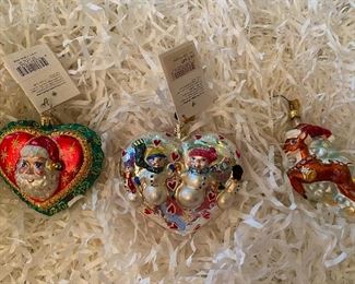 Christopher Radko
121)”Heart of Christmas” 48.
122)”Nine of Hearts” As is  damaged as seen in photo. 24.
123)Small Reindeer with hat   28.