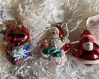 Christopher Radko 136)"Gift of Love Canterbury  Garden" 40.                                                                        137)"Onesie Twosome"36.                             
138)"Heritage Santa" 28.