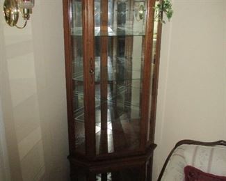 Corner curio cabinet