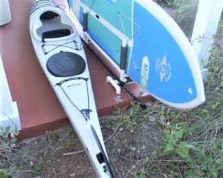KAYAK, ONE OF TWO AVAILABLE,  AND PADDLE BOARD