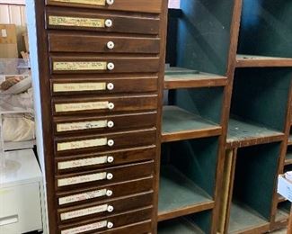 Large antique shelf with lots of narrow drawers! Left side