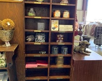 Narrow antique bookcase.