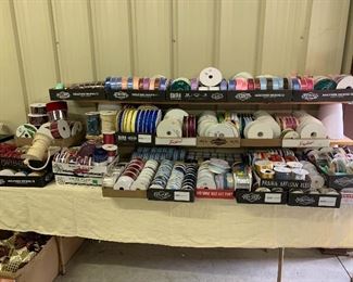 Large assortment of ribbons, both an opened and open packages