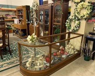 Antique curved and glass display case