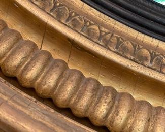 Regency Period Convex Mirror. Flanked by Gilt Wood Girandole Arms. Apron is Flanked by Florettes. English Circa 1820. Measures 40" W x 48" H. Photo 4 of 5.