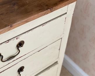 Three-Drawer Distressed Finish Bedside Table. Measures 29" W x 19" H x 30" H. Photo 2 of 2.