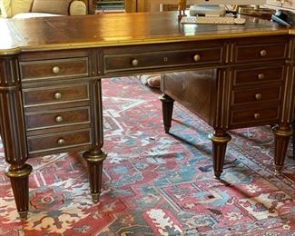 Empire French Mahogany Desk with Brass Mounts Stamped: J.T.Needs, 100 New Bond Street, London. & Late J. Bramah, 186 Piccadilly. Leather Topped with Brass Trim. Measures 60" W x 34" D x 31" H with 25" Clearance. Circa 1840. Photo 1 of 8.