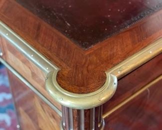 Empire French Mahogany Desk with Brass Mounts Stamped: J.T.Needs, 100 New Bond Street, London. & Late J. Bramah, 186 Piccadilly. Leather Topped with Brass Trim. Measures 60" W x 34" D x 31" H with 25" Clearance. Circa 1840. Photo 7 of 8.