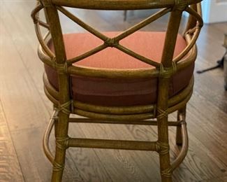 Pair of Cane and Wicker Arm Chairs with Cushions. Each Measures 22" W x 22" D. Photo 2 of 2.