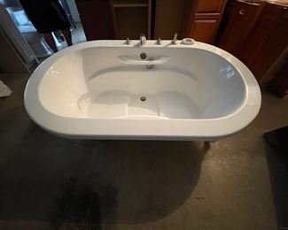 Bain Ultra Soaker Tub. Measures 71" L x 41" W x 22" D. Photo 1 of 3.