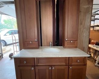 Vanity with Single Sink. Measures 51" W x 7' H x 22.5" D. Counter Height is 35" H. Grohe Faucet. Photo 1 of 2.