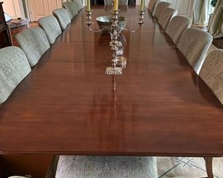 Holly Hunt English Reproduction Dining Table. Seats up to 14. Measures 52" W x 29" H x 176" L . Has two 24" leaves and one 42" leaf. Photo 1 of 3.