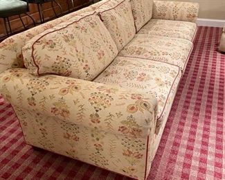 Al Vivo 3-Seat Sofa Upholstered in Lee Jofa Fabric with Hinson Garett red leather trim. Measures 108" W x 40" D. Photo 1 of 4.