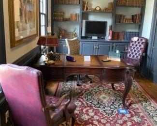 Pair Tufted Leather armchairs.   $1,000 pair