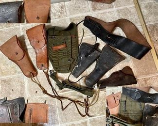 Leather military gun holsters..