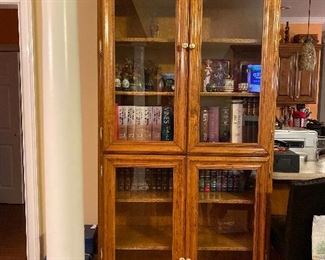 Solid oak bookcase. Handmade by local woodworker. Solid!! 8 feet high. One piece. $950.