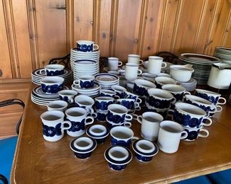 Arabia "Anemone" pottery. Remaining available items: 17 demitasse cups & saucers (will divide into one set of 8 and one set of 9)