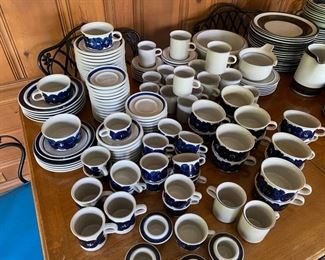 Arabia "Anemone" pottery. Remaining available items:  17 demitasse cups & saucers (will divide into one set of 8 and one set of 9)