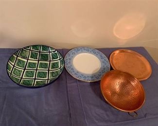 Three plates and a copper bowl