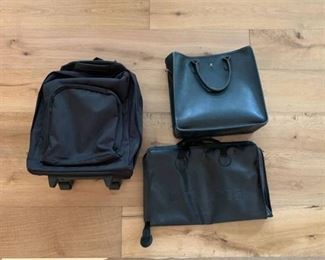 Rolling backpack and two other bags