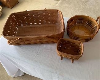 Three Longaberger baskets
