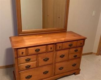 Six drawer dresser with attached mirror