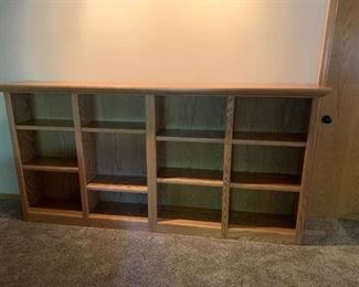 Three piece shelving unit approx 8 ft by 4 ft by 12 in in basement