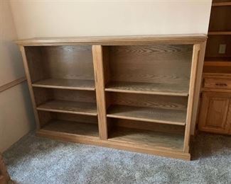 One piece shelving unit approx 6 ft by 5 ft by 18 in in basement