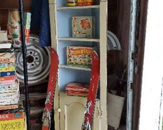 Small corner cabinet and vintage games