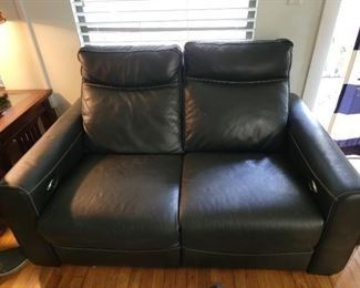 Dual recycling leather love seat 