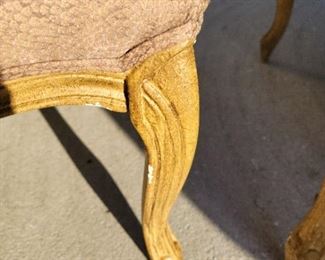 2 Arm chairs close up of leg and fabric 