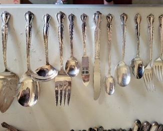 Roger's and BRO IS set of 74 (1 pie server, 3 serving spoons, 1 serving fork, 1 ladle, 1 butter knife, 1 sugar spoon, 13 knives, 11 forks, 11 dessert forks, 12 soup spoons, 13 spoons, 6 iced tea spoons) $75