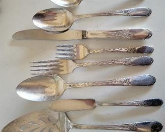 Roger's silver plated cutlery set of 51 (1 pie server, 3 serving spoons, 8 knives, 1 butter knife, 1 sugar spoon, 8 forks, 8 dessert forks, 13 spoons, 8 soup spoons) $50