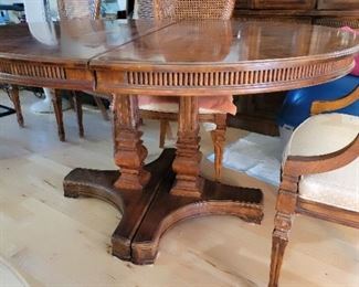 Oval dining table with 2 leaf's and table top cover.  43in X 53in length leaves add another 44in.  Chairs not included already sold $150