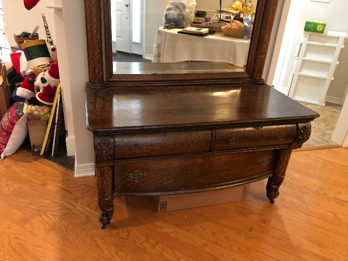 Incredible Tiger Oak dresser and mirror. Ornate carving.